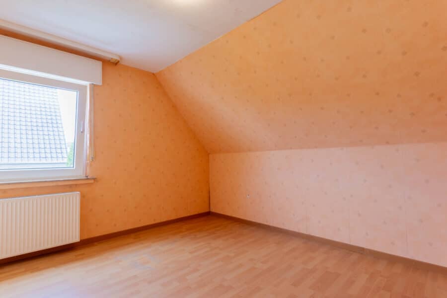 Zweifamilienhaus auf einem großzügigen und sonnigen Grundstück in zentraler Wohnlage von Ense-Bremen - Schlafzimmer Obergeschoss