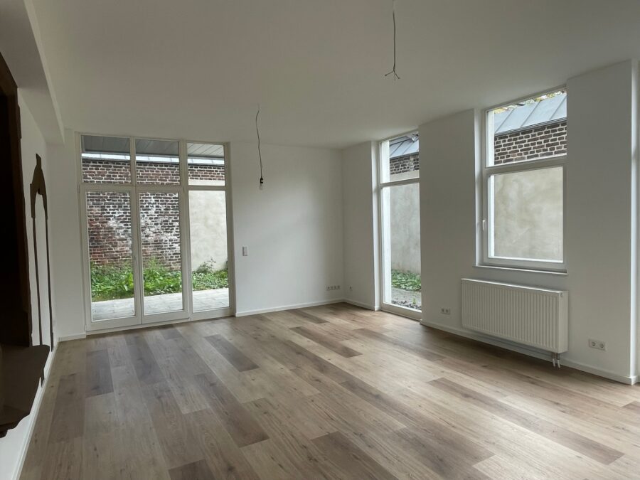 Moderne 3-Zimmer-Erdgeschosswohnung mit großzügiger Terrasse - Wohnzimmer