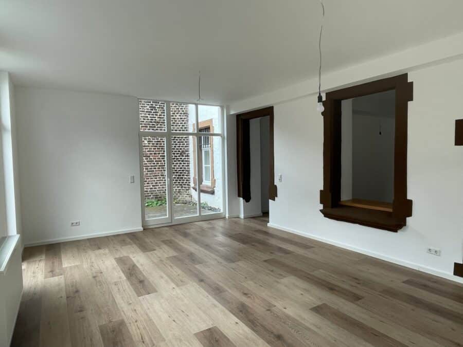 Moderne 3-Zimmer-Erdgeschosswohnung mit großzügiger Terrasse - Wohnzimmer t